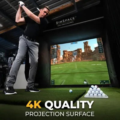 Indoor golf simulator enclosure featuring premium black velour light-blocking material