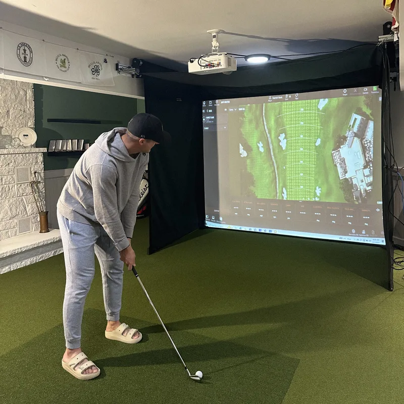 SportScreen Vanish 13H Golf Simulator Enclosure In Use