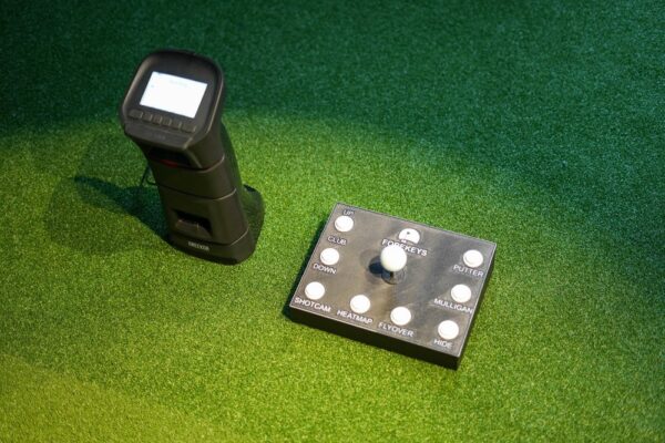 Titleist Pro V1 ball joystick on GSPro control box for intuitive golf simulator navigation