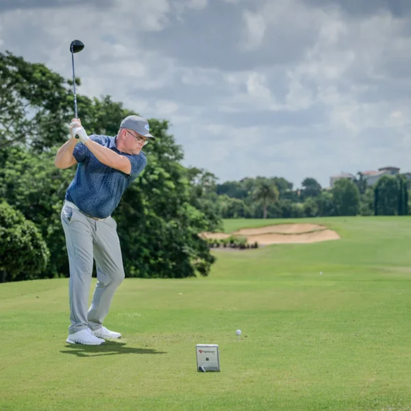 Golf launch monitor FlightScope Mevo Gen2 in outdoor practice setup with 2.4m positioning requirement