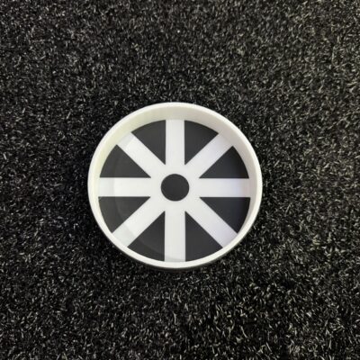 Golf putting cup reducer with 8-spoke design showing white spokes and black triangular sections for precision putting practice